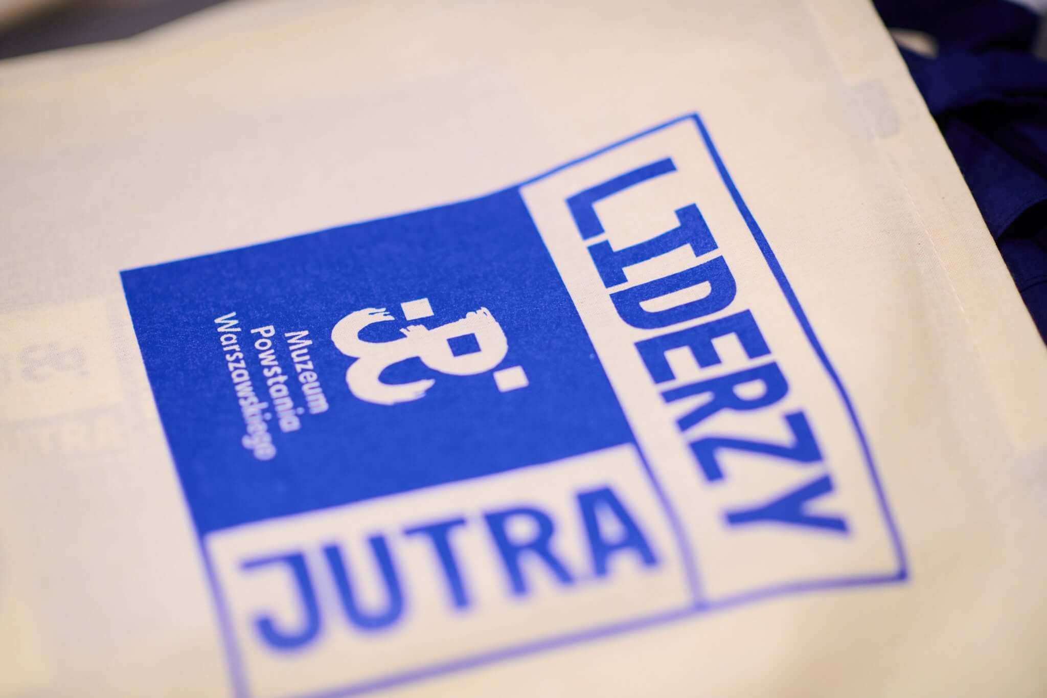 Cotton tote bag featuring the Liderzy Jutra event visual identity for the Warsaw Rising Museum.