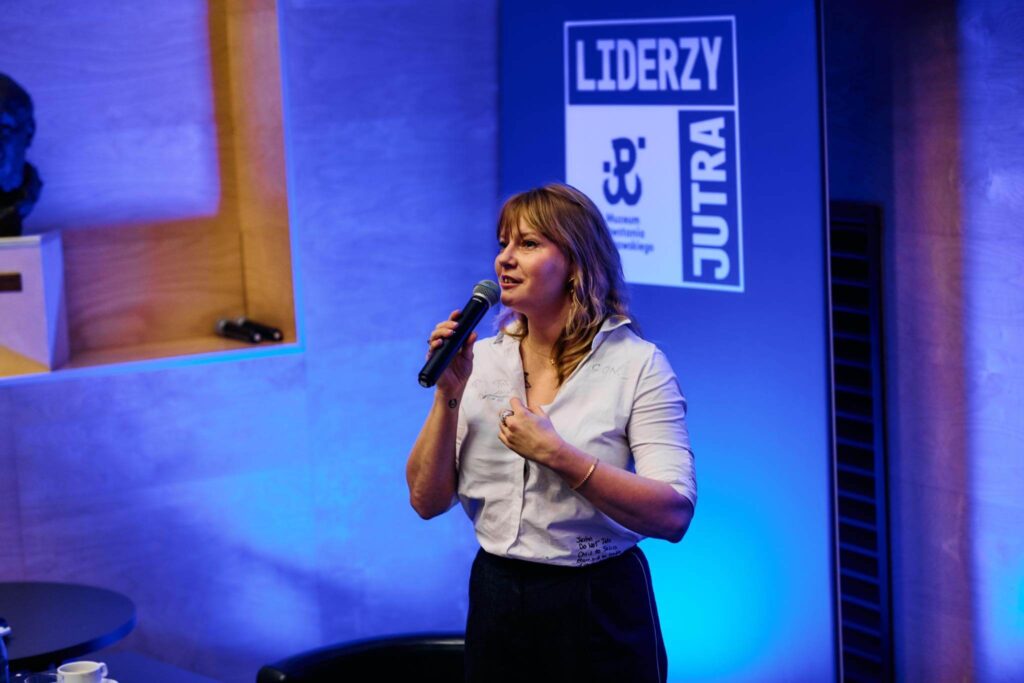A speaker gives a talk during the Liderzy Jutra conference at the Warsaw Rising Museum.