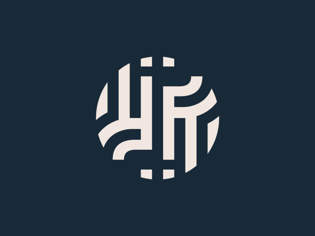 Geometryczny sygnet zaprojektowany dla marki IP Land
